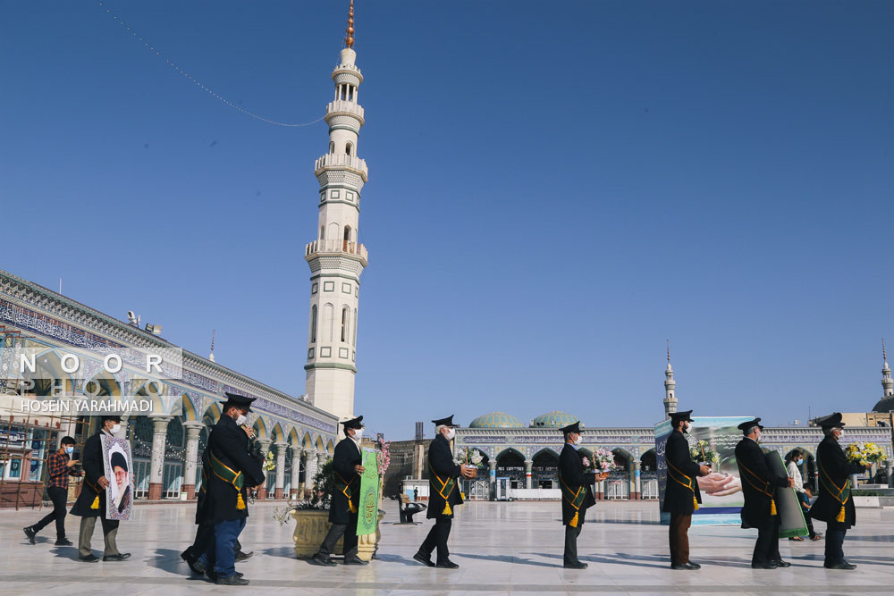 آیین شست و شوی گنبد و تعویض پرچم مسجد جمکران